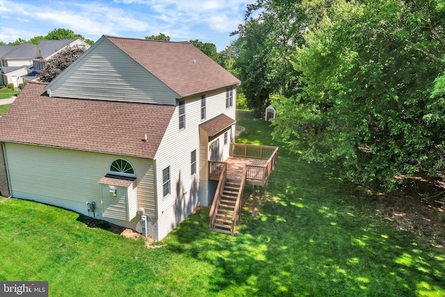 7 Chattam Ct, Baltimore, MD 21234 - view of property exterior with roof with shingles, stairway, a wooden deck, and a yard