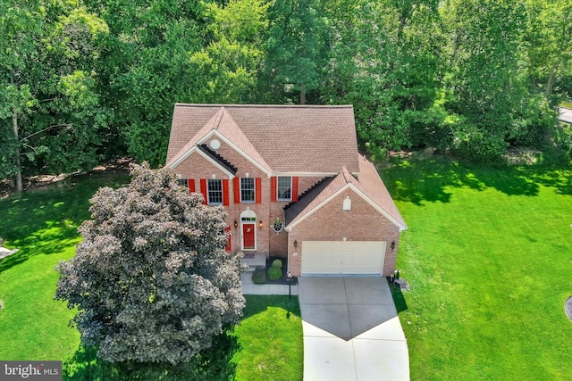 7 Chattam Ct, Baltimore, MD 21234 - view of front of house with brick siding, a front lawn, a garage, and driveway