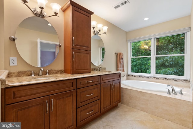 5212 Braywood Dr, Centreville, VA 20120 - full bath with a garden tub, tile patterned flooring, double vanity, recessed lighting, and a chandelier