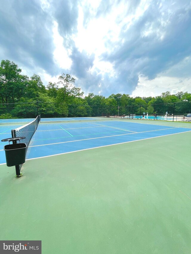 5212 Braywood Dr, Centreville, VA 20120 - view of tennis court with fence and community basketball court