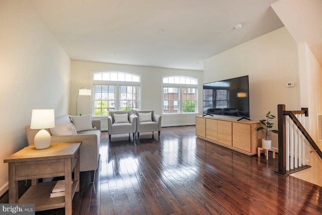 living room with dark wood-style floors and baseboards