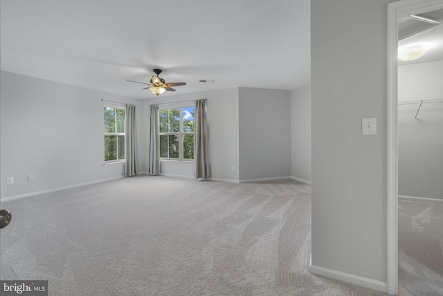 23466 Twin Falls Ter, Brambleton, VA 20148 - unfurnished room featuring light colored carpet, a ceiling fan, and baseboards