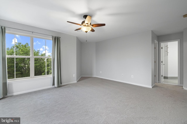 23466 Twin Falls Ter, Brambleton, VA 20148 - empty room with a ceiling fan, carpet floors, and baseboards