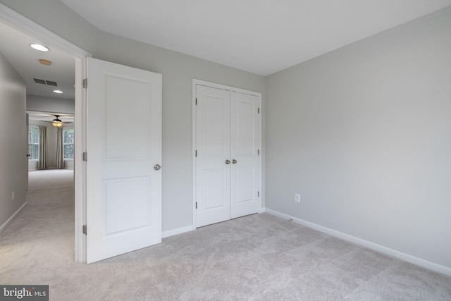 23466 Twin Falls Ter, Brambleton, VA 20148 - unfurnished bedroom with carpet, baseboards, and a closet
