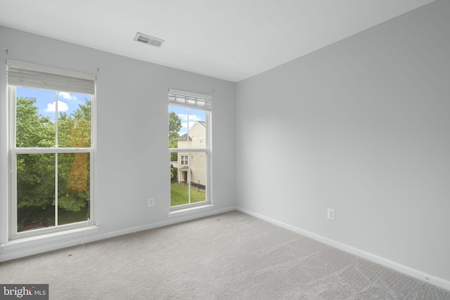 23466 Twin Falls Ter, Brambleton, VA 20148 - spare room featuring baseboards and carpet