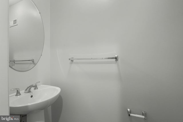 23466 Twin Falls Ter, Brambleton, VA 20148 - bathroom featuring a sink