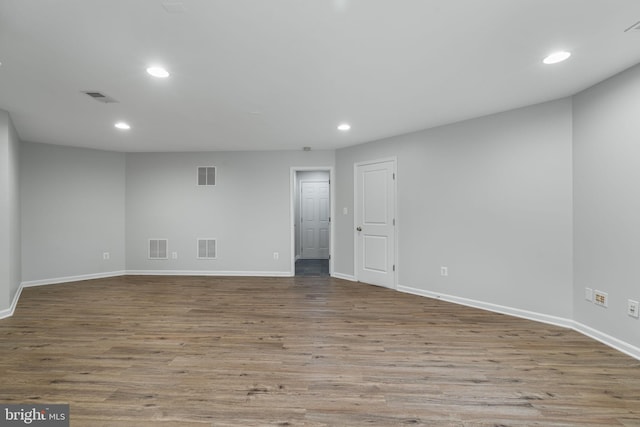 23466 Twin Falls Ter, Brambleton, VA 20148 - unfurnished room with wood finished floors, recessed lighting, and baseboards