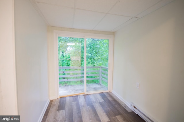 384 Nancy Jack Rd, Gerrardstown, WV 25420 - unfurnished room with a baseboard radiator, baseboards, wood finished floors, and a paneled ceiling