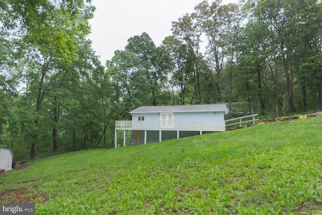 384 Nancy Jack Rd, Gerrardstown, WV 25420 - view of grassy yard with an outdoor structure and a view of trees