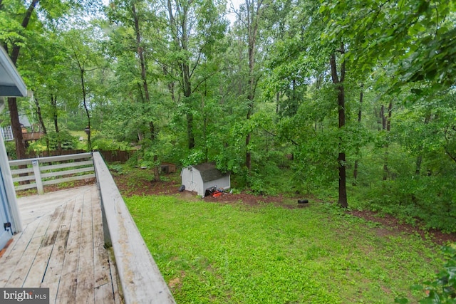 384 Nancy Jack Rd, Gerrardstown, WV 25420 - view of yard featuring a storage unit, an outbuilding, and a wooden deck