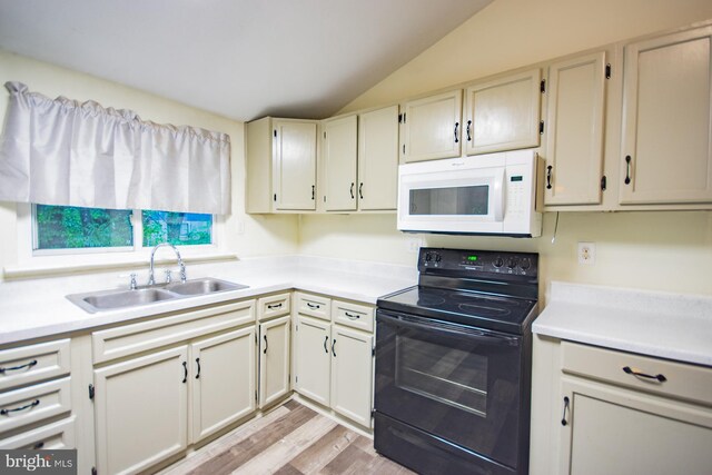 384 Nancy Jack Rd, Gerrardstown, WV 25420 - kitchen featuring white microwave, black range with electric cooktop, a sink, lofted ceiling, and light countertops