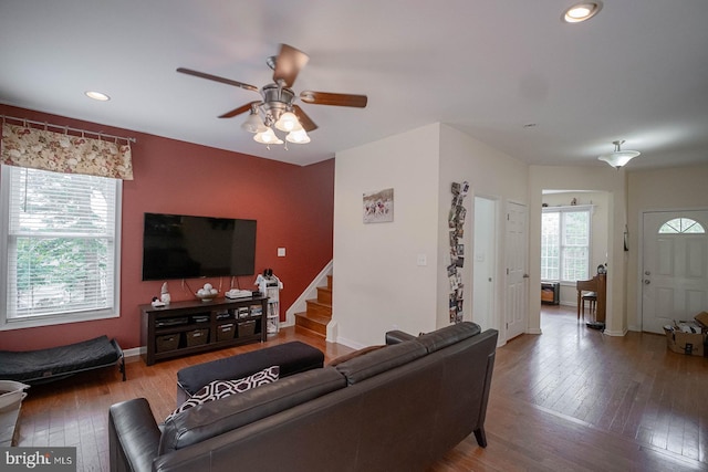 living room with hardwood / wood-style floors, a ceiling fan, stairway, recessed lighting, and baseboards