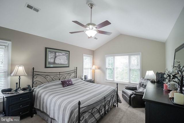 bedroom with carpet flooring, lofted ceiling, a ceiling fan, and baseboards