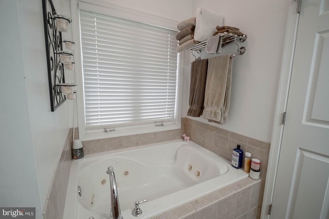 full bath featuring a whirlpool tub