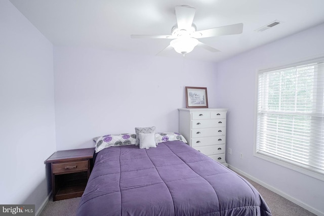 bedroom featuring carpet flooring, baseboards, and ceiling fan