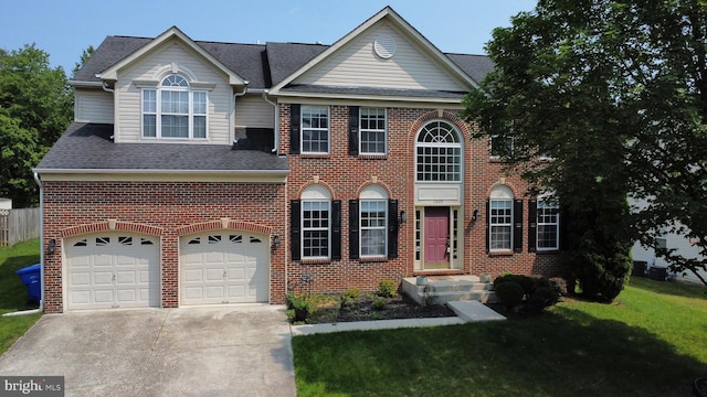 2405 Colber Ct, Waldorf, MD 20603 - colonial inspired home with concrete driveway, brick siding, an attached garage, a shingled roof, and a front yard