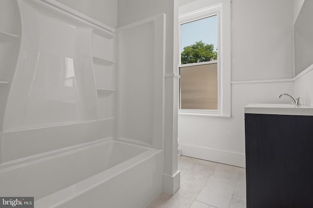 442 S Prince St, Lancaster, PA 17603 - bathroom featuring vanity, baseboards, tile patterned floors, and  shower combination