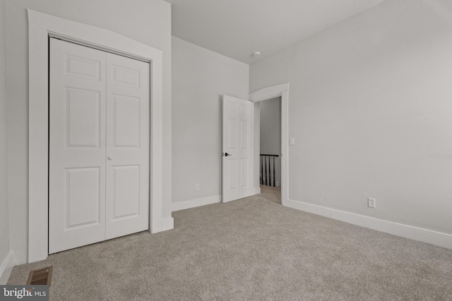442 S Prince St, Lancaster, PA 17603 - unfurnished bedroom featuring carpet flooring, a closet, and baseboards