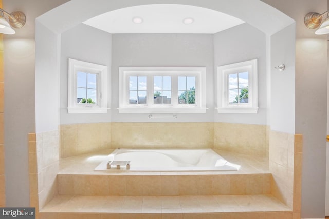 full bathroom featuring a bath