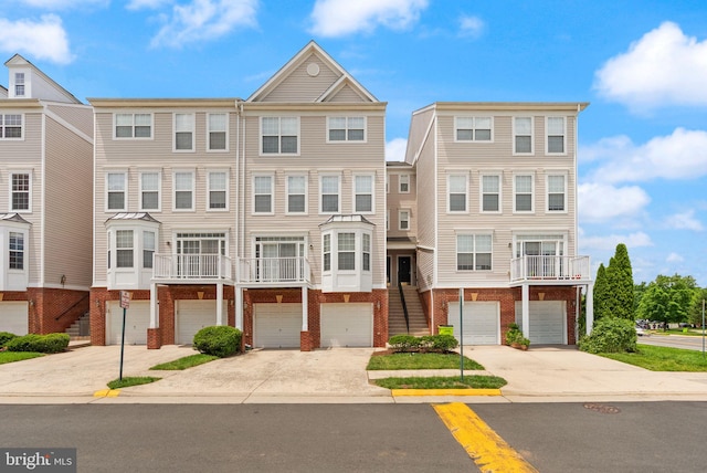 2506 Einstein St Unit 259, Herndon, VA 20171 - townhome / multi-family property with driveway, a garage, and brick siding