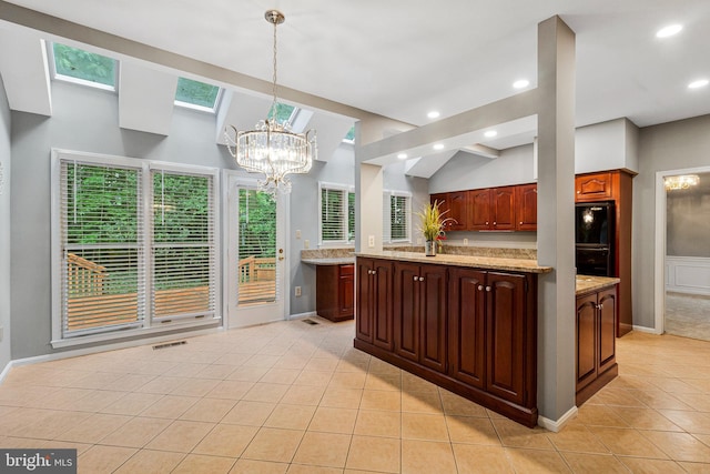 kitchen with a chandelier, light tile patterned flooring, pendant lighting, recessed lighting, and a skylight