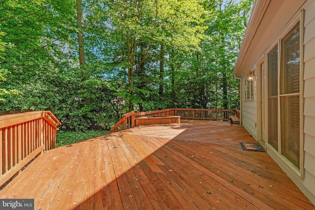 deck with view of wooded area