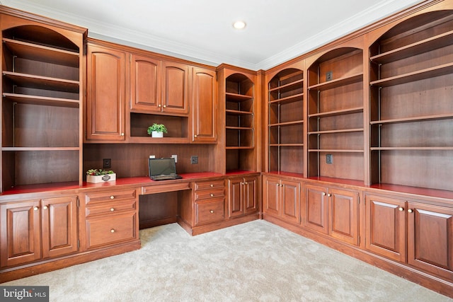 unfurnished office with built in study area, light carpet, ornamental molding, and recessed lighting