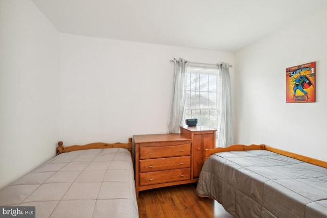 bedroom featuring wood finished floors