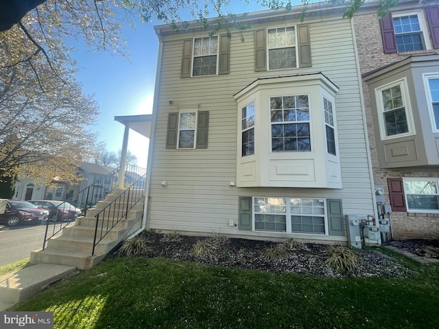 1372 Walkabout Ct Unit 53, Eldersburg, MD 21784 - view of home's exterior featuring stairway