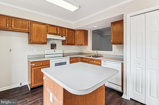1372 Walkabout Ct Unit 53, Eldersburg, MD 21784 - kitchen with white appliances, under cabinet range hood, a sink, brown cabinets, and ornamental molding