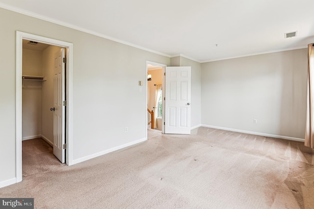 1372 Walkabout Ct Unit 53, Eldersburg, MD 21784 - unfurnished bedroom featuring carpet, ornamental molding, baseboards, a spacious closet, and a closet