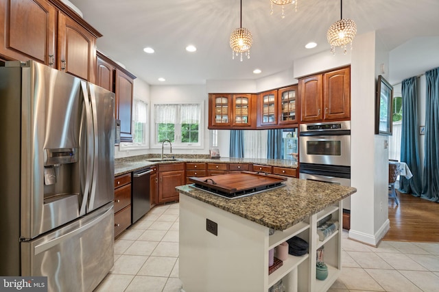 7814 Abbey Oaks Ct, Manassas, VA 20112 - kitchen with stainless steel appliances, a sink, light tile patterned floors, a chandelier, and dark stone counters