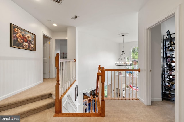 7814 Abbey Oaks Ct, Manassas, VA 20112 - hall featuring carpet flooring, an upstairs landing, baseboards, a chandelier, and recessed lighting