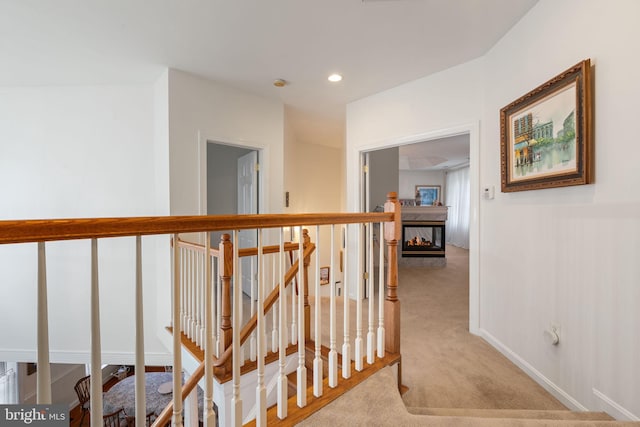 7814 Abbey Oaks Ct, Manassas, VA 20112 - hallway featuring carpet, an upstairs landing, recessed lighting, and baseboards