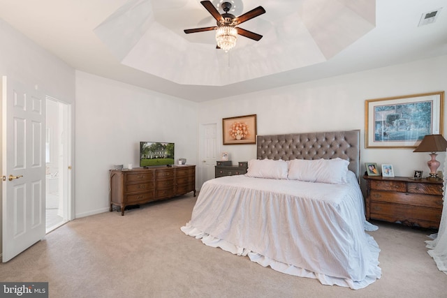 7814 Abbey Oaks Ct, Manassas, VA 20112 - carpeted bedroom featuring a tray ceiling and a ceiling fan