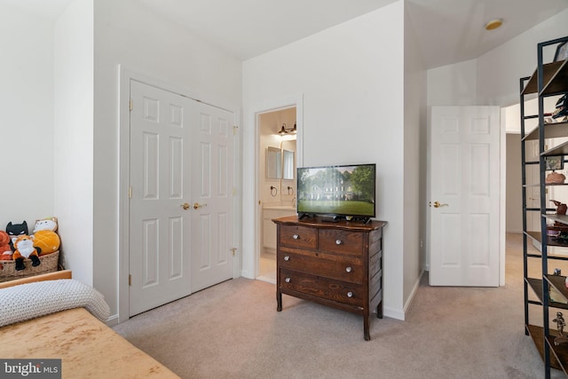 7814 Abbey Oaks Ct, Manassas, VA 20112 - carpeted bedroom featuring a closet, ensuite bathroom, and baseboards