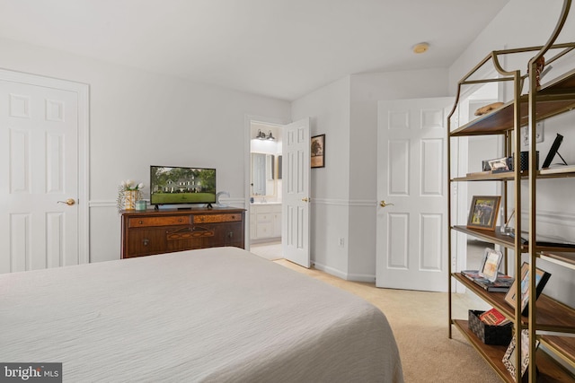 7814 Abbey Oaks Ct, Manassas, VA 20112 - bedroom with light colored carpet, ensuite bath, and baseboards