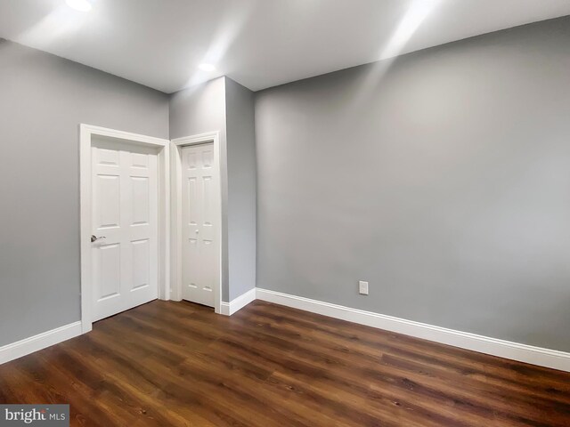 2059 E Atlantic St, Philadelphia, PA 19134 - unfurnished room featuring baseboards and dark wood-type flooring