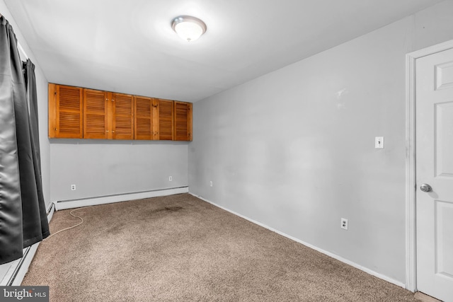 102 Sunset St, Browns Mills, NJ 08015 - unfurnished room featuring carpet flooring, a baseboard radiator, baseboards, and baseboard heating