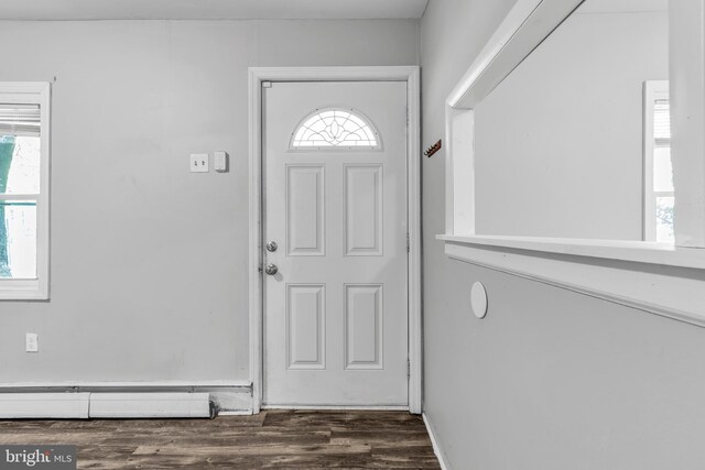 102 Sunset St, Browns Mills, NJ 08015 - entryway with dark wood-type flooring and baseboard heating