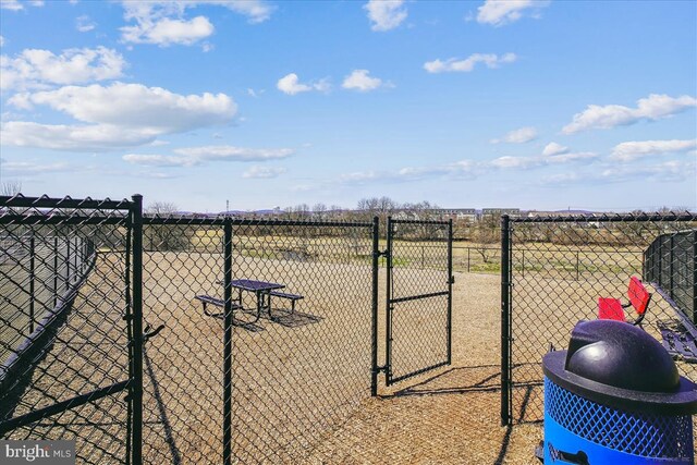 view of yard featuring a gate and fence