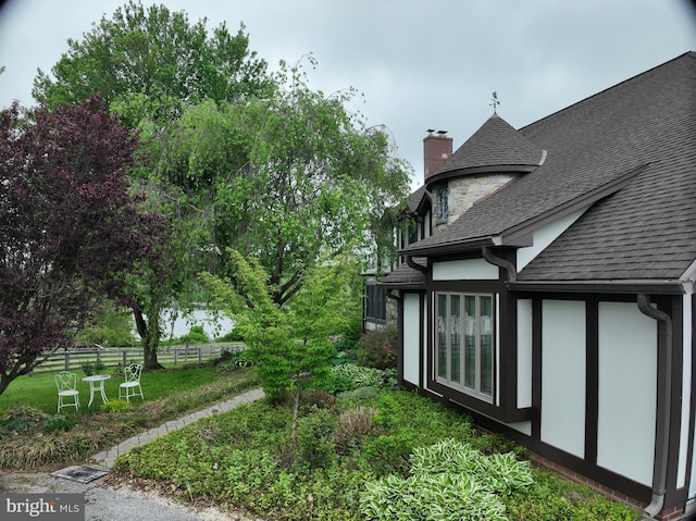 955 Lucabaugh Mill Rd, Westminster, MD 21157 - view of property exterior featuring a shingled roof and a chimney