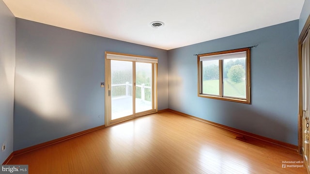 955 Lucabaugh Mill Rd, Westminster, MD 21157 - unfurnished room with healthy amount of natural light, wood finished floors, and baseboards