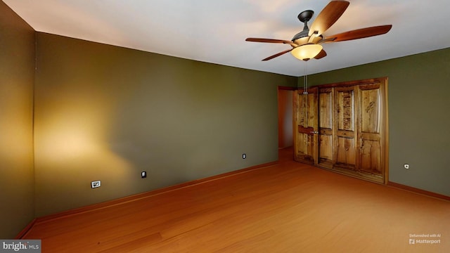 955 Lucabaugh Mill Rd, Westminster, MD 21157 - unfurnished room featuring a ceiling fan, wood finished floors, and baseboards
