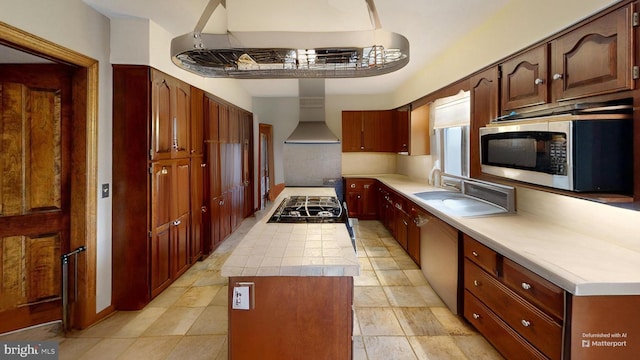 955 Lucabaugh Mill Rd, Westminster, MD 21157 - kitchen featuring appliances with stainless steel finishes, wall chimney range hood, a kitchen island, exhaust hood, and tile countertops