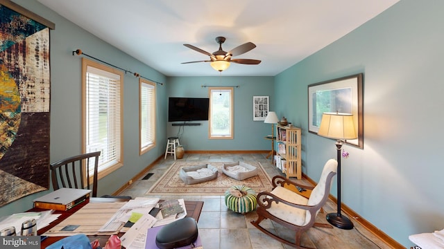 955 Lucabaugh Mill Rd, Westminster, MD 21157 - tiled living room featuring baseboards and a ceiling fan