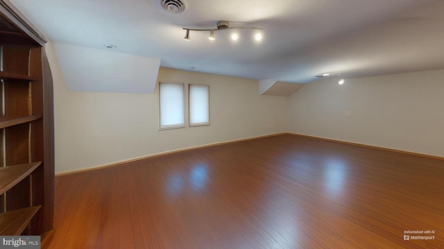 955 Lucabaugh Mill Rd, Westminster, MD 21157 - additional living space with wood finished floors, baseboards, and vaulted ceiling