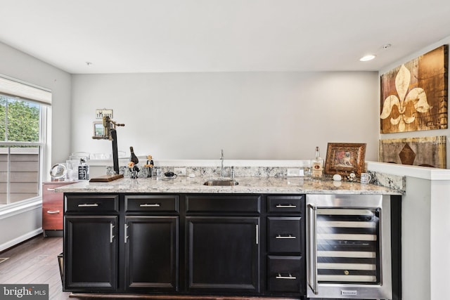 3959 Norton Pl, Fairfax, VA 22030 - indoor bar with beverage cooler, wood finished floors, recessed lighting, and baseboards
