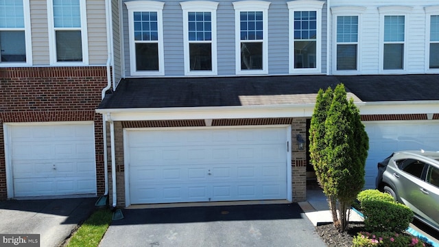 garage with driveway