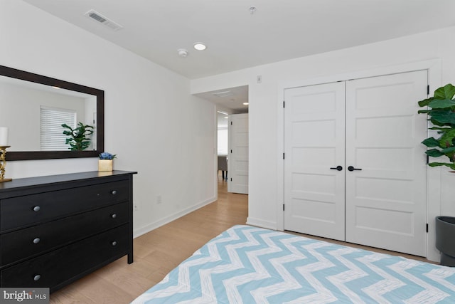 1716 Cambridge St Unit 3, Philadelphia, PA 19130 - bedroom with light wood-type flooring, a closet, and baseboards